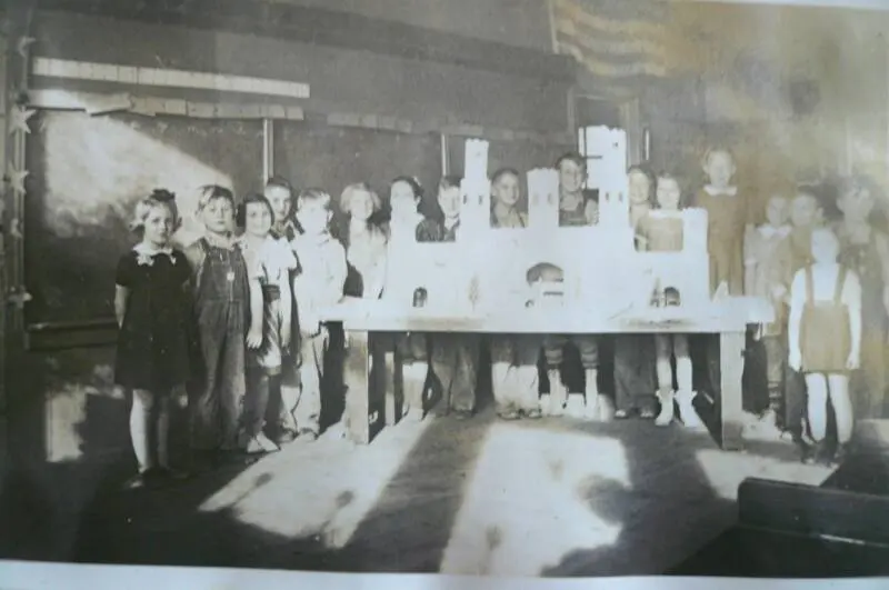 Trivoli School, album of teacher Leatha Folkenroth Whitlock: Students collecting scrap metal for the war